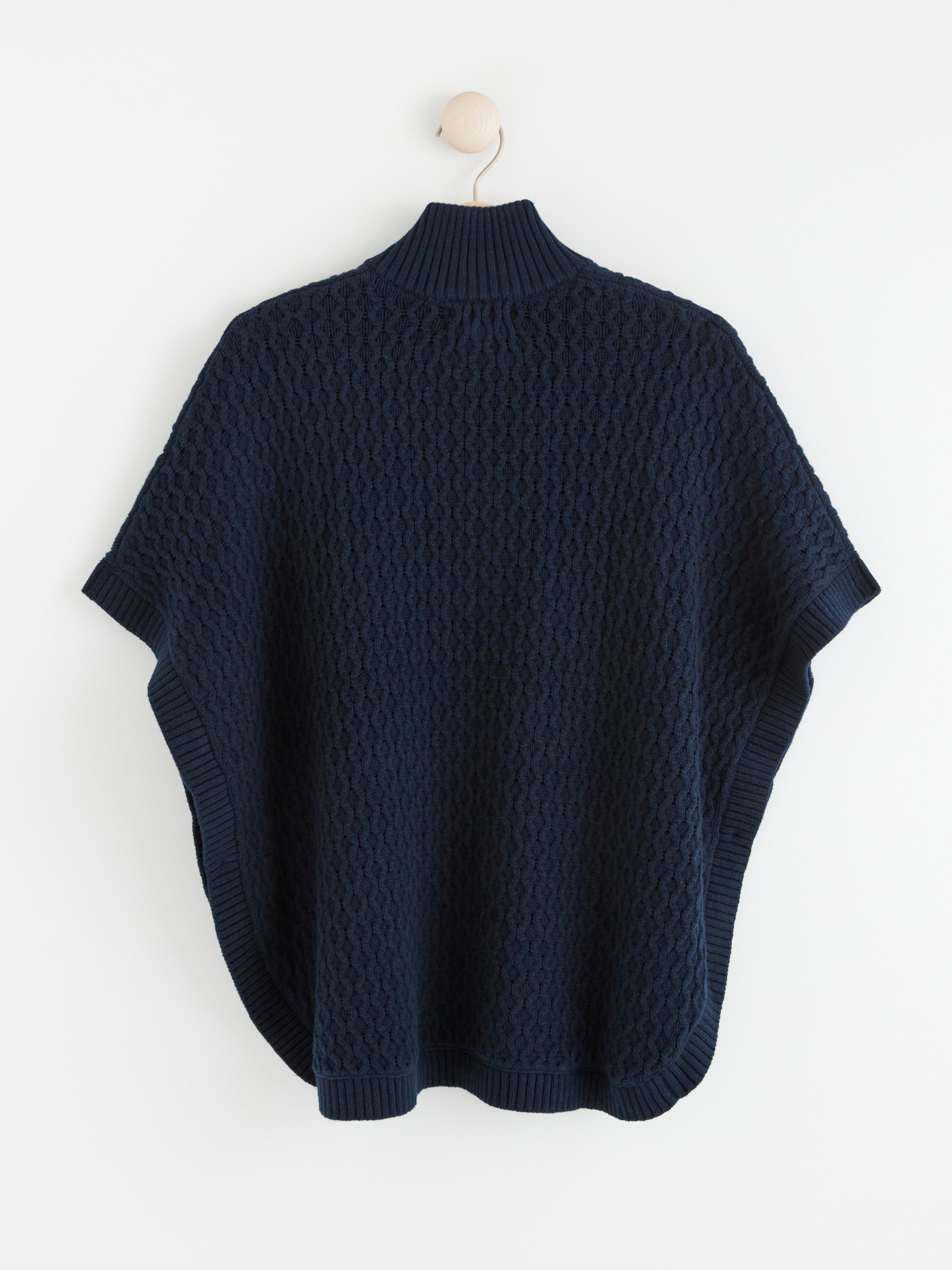 Stickad poncho