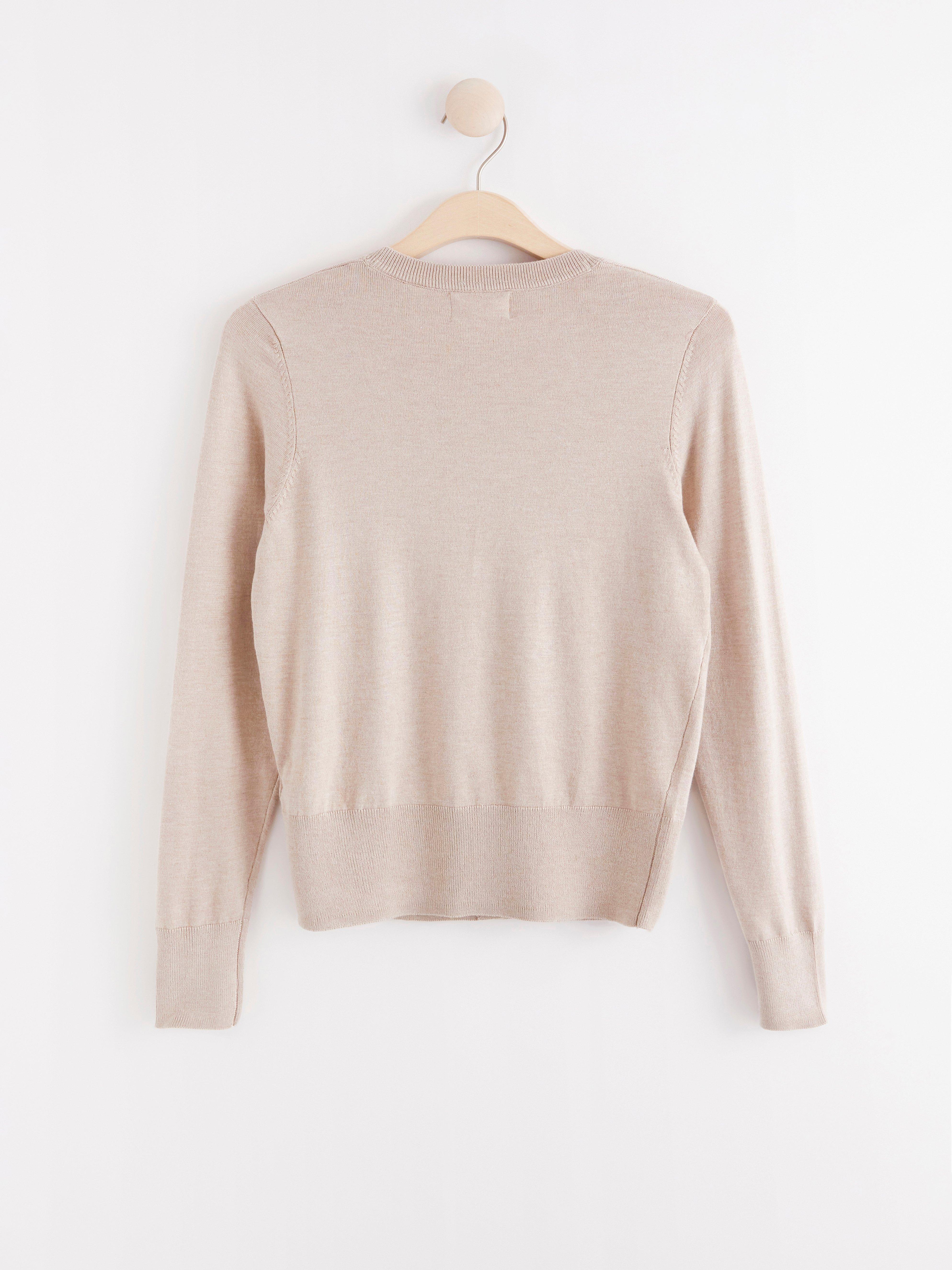 Finstickad cardigan