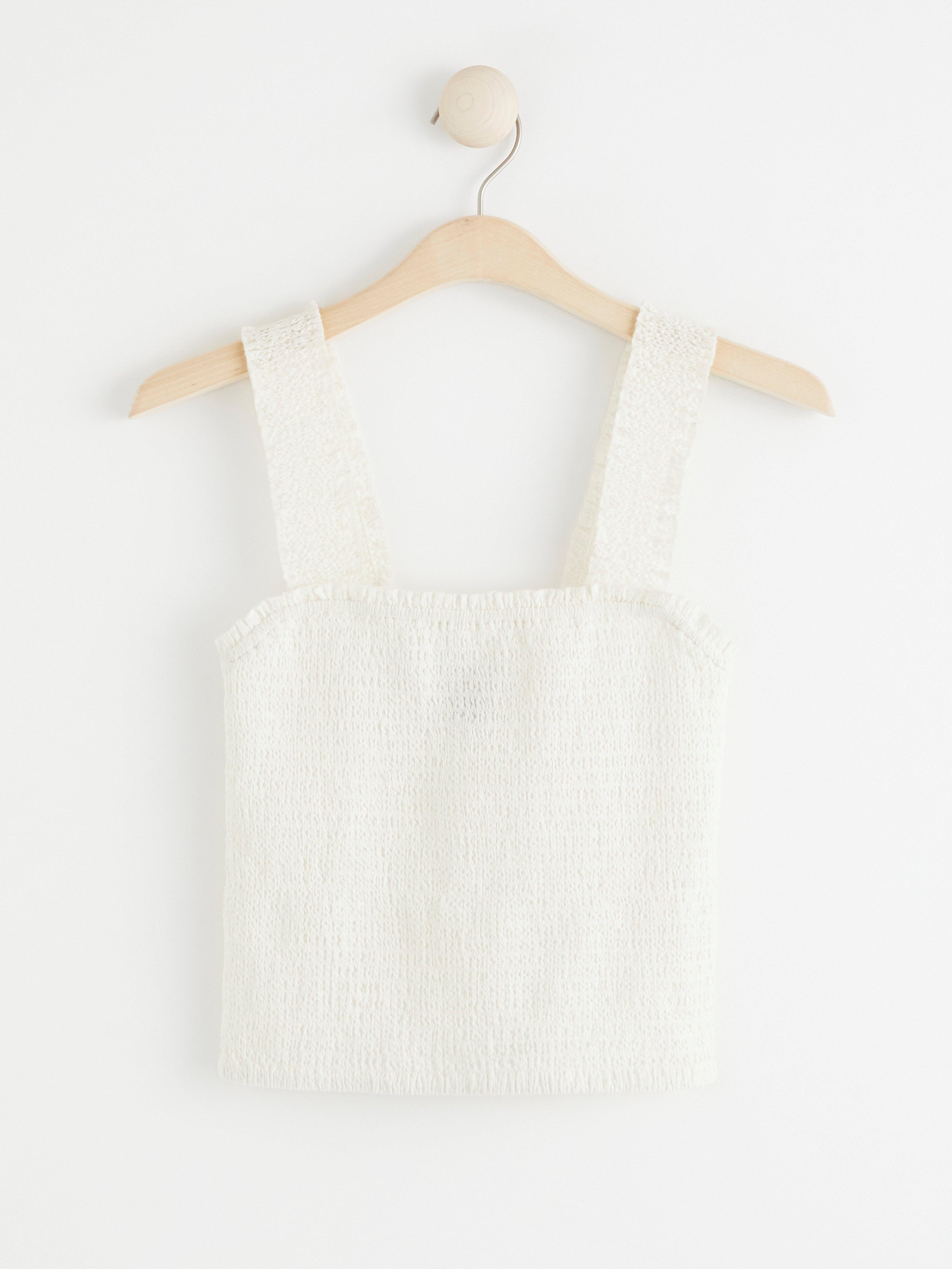 Croppat linne med smock