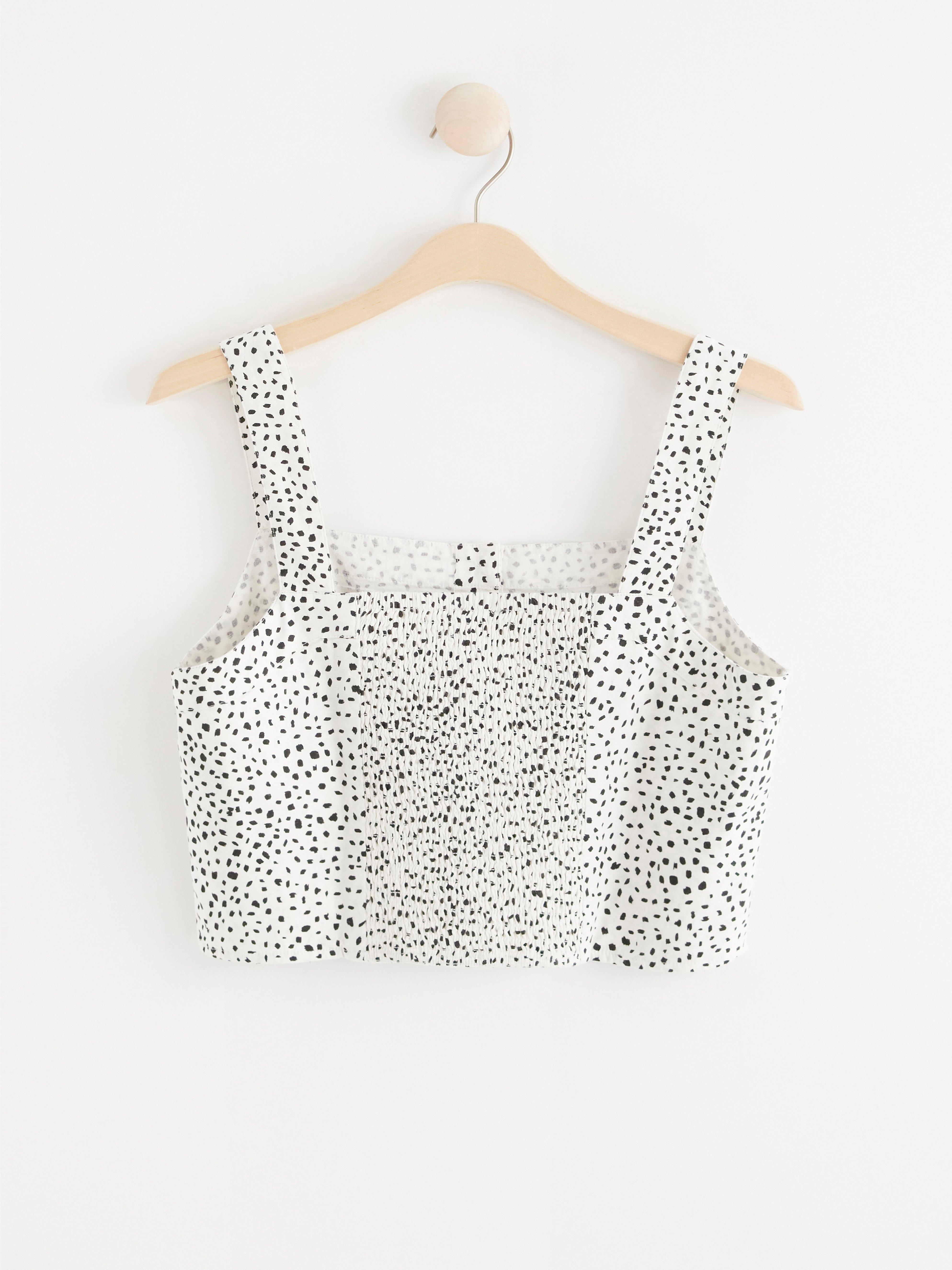 Croppad ärmlös blus