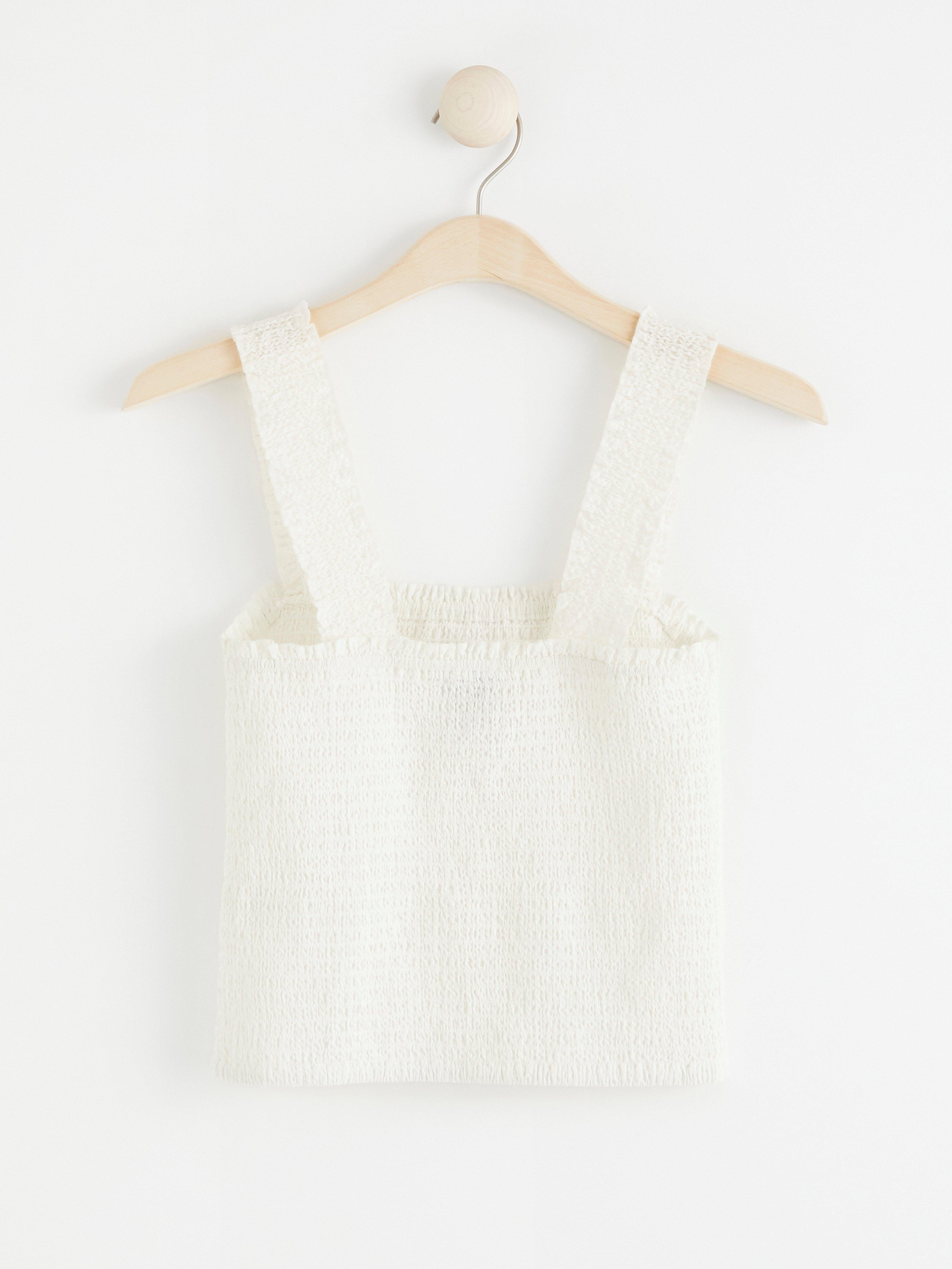 Croppat linne med smock