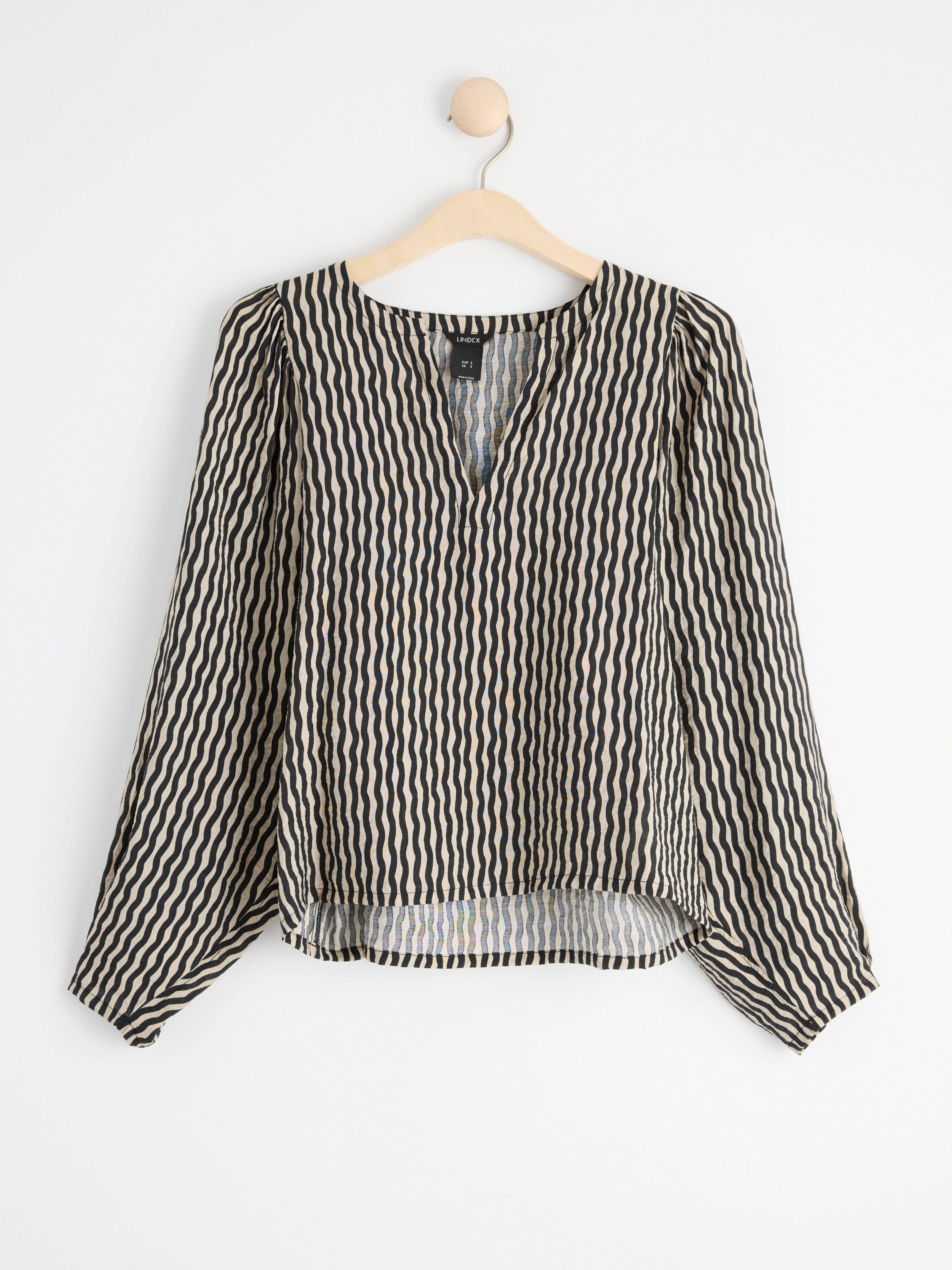 Mönstrad blus med puffärm